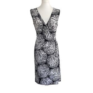 Attention sleeveless black and white wrap dress